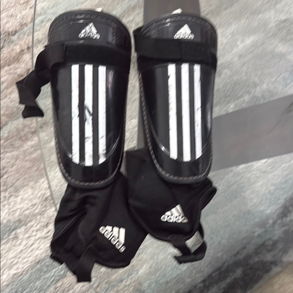 Adidas Black Shin Guards with White Stripes